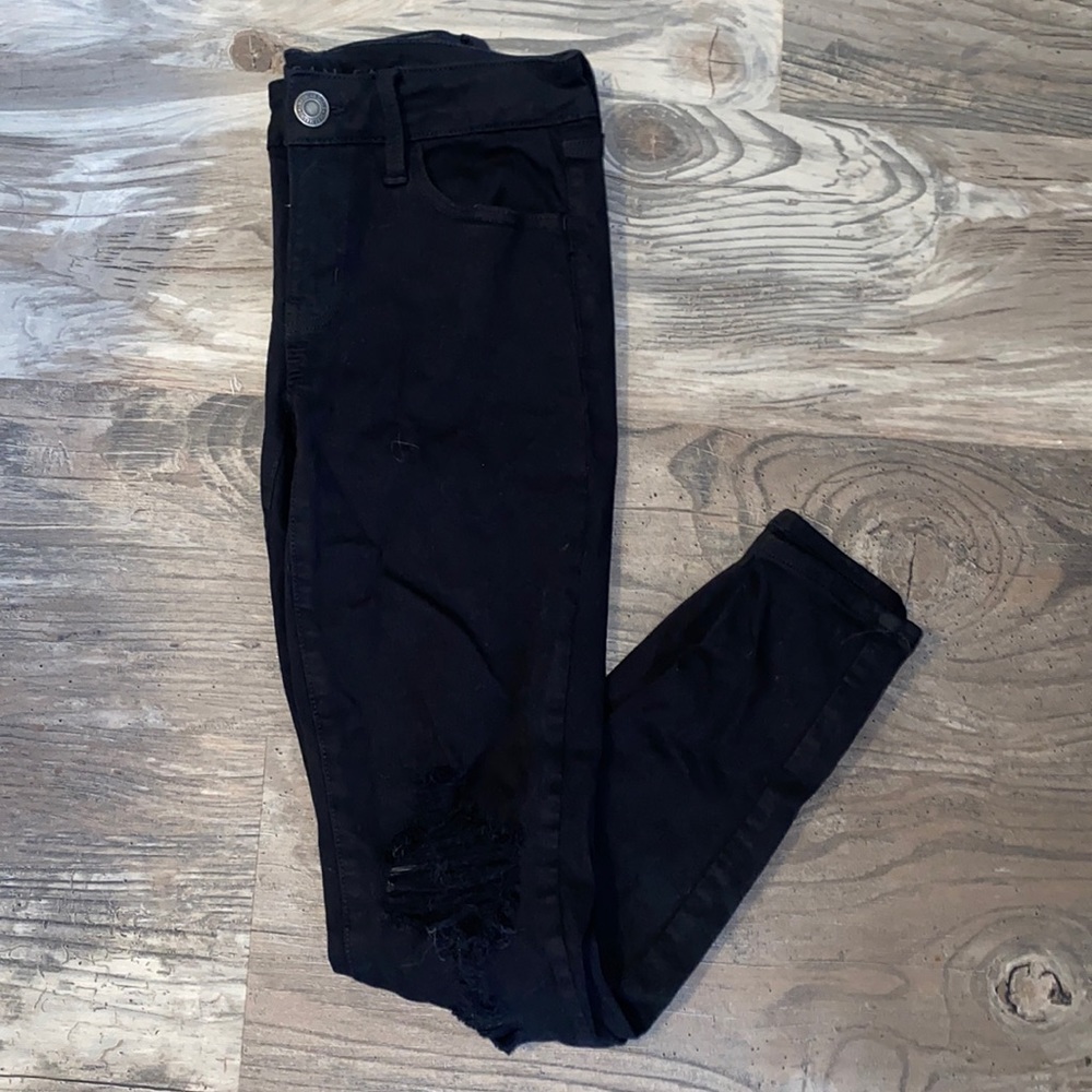 Distressed black jeans